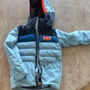 Helly Hansen Light Blue and Navy Kids ski Jacket with Orange Logo